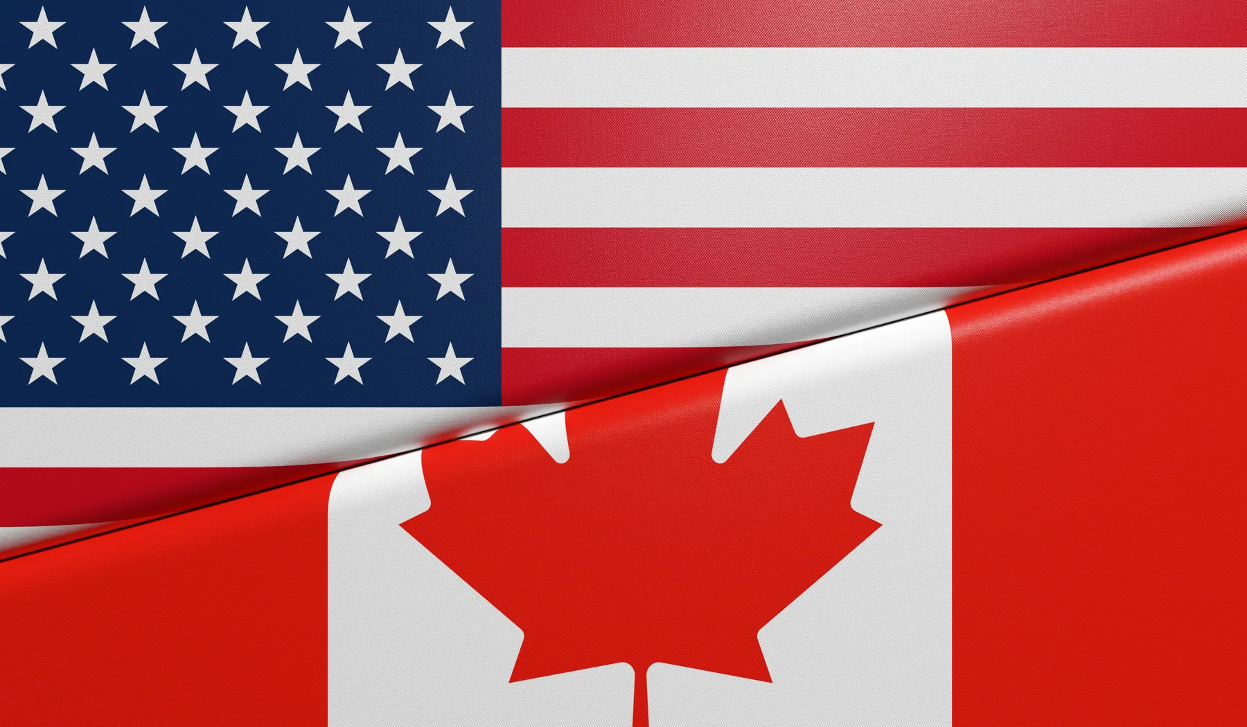 The United States and Canadian flags side by side